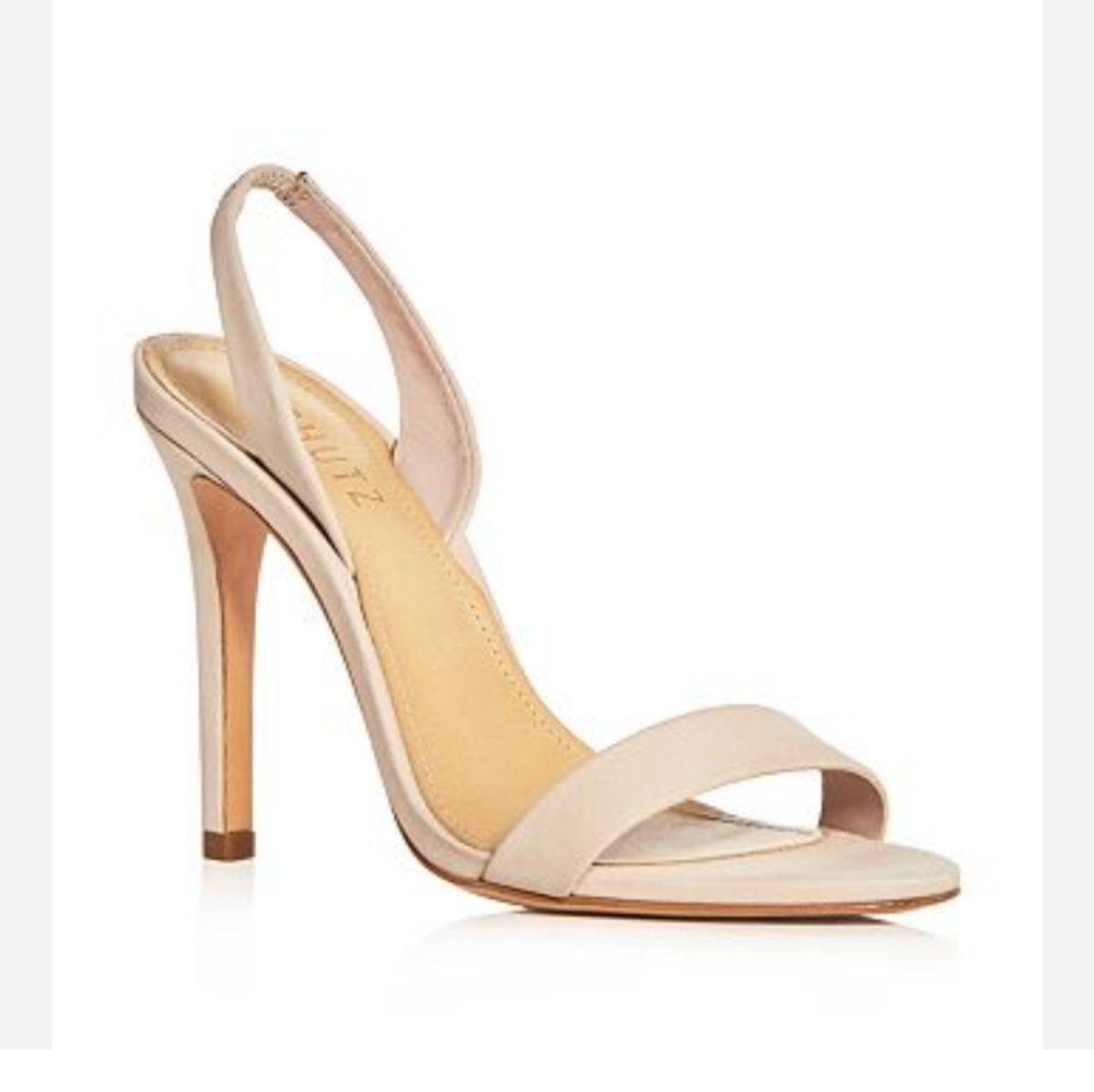 Schutz slingbacks 9 Nude in color.  Box available. Like new worn twice.